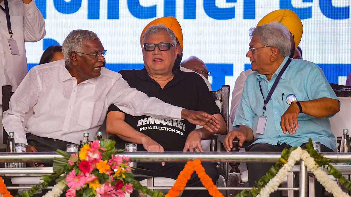 CPI's D Raja, TMC's Derek O'Brien and CPI(M) General Secretary Sitaram Yechury during I.N.D.I.A. bloc's 'Loktantra Bachao Rally' at Ramlila Maidan, in New Delhi.