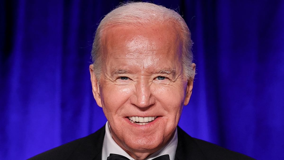 US President Joe Biden reacts as he attends the White House Correspondents' Association Dinner in Washington, on April 27, 2024.