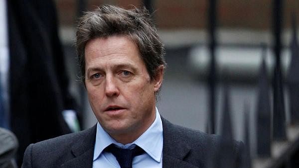 British actor Hugh Grant settles privacy lawsuit against publisher of 'The Sun'