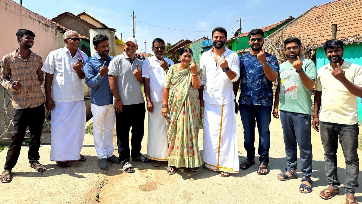 Actor Dhananjaya KA casted his vote in his home town. He shared a series of photos alongside family flaunting their ink marked finger.