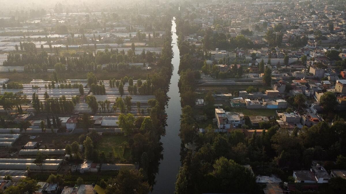 A drone view shows the water canals in Xochimilco, where the only reminder of traditional Pre-Hispanic land-use in the lagoons of the Mexico City basin is practiced, ahead of Earth Day, Mexico.