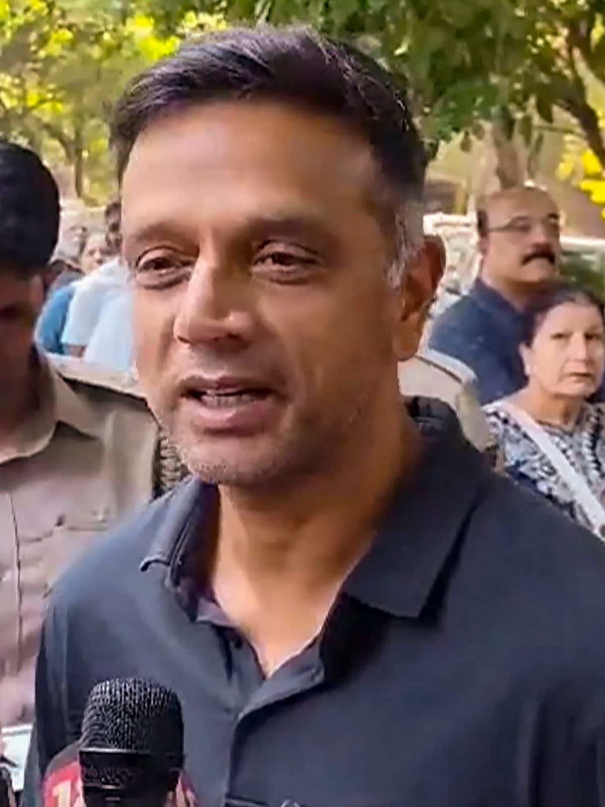 Former cricketer Rahul Dravid talks to the media after casting his vote in the second phase of Lok Sabha elections, in Bengaluru.