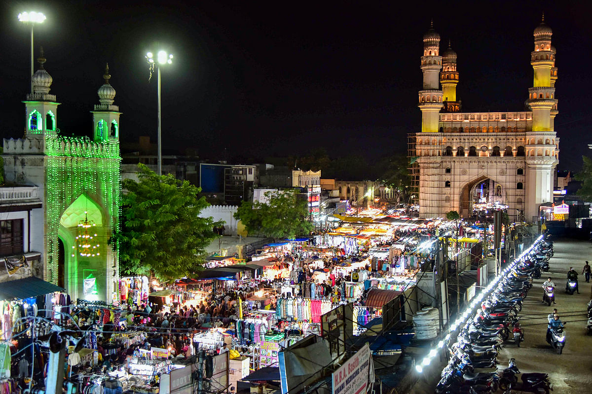 A street near the Charminar is illuminated on the last day of the holy month of Ramzan ahead of the Eid-ul-Fitr festival, in the Old City of Hyderabad, Wednesday.