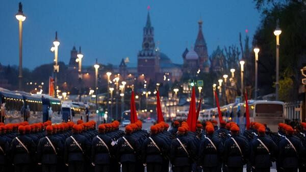 Members of Russia's Emergencies Ministry line up before a rehearsal for a military parade marking the anniversary of the victory over Nazi Germany in World War II in central Moscow, Russia, April 26, 2024.