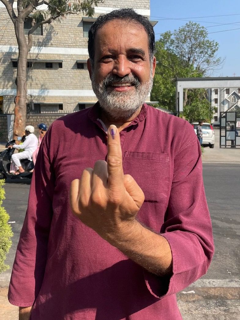 Philanthropist and former CFO of Infosys T V Mohandas Pai after casting his vote.