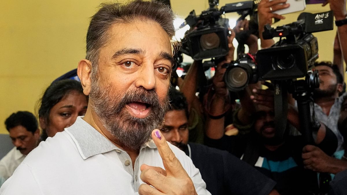 Makkal Needhi Maiam leader and actor Kamal Haasan gets clicked as he exits after casting his vote in the first phase of Lok Sabha elections, at a polling station in Chennai.