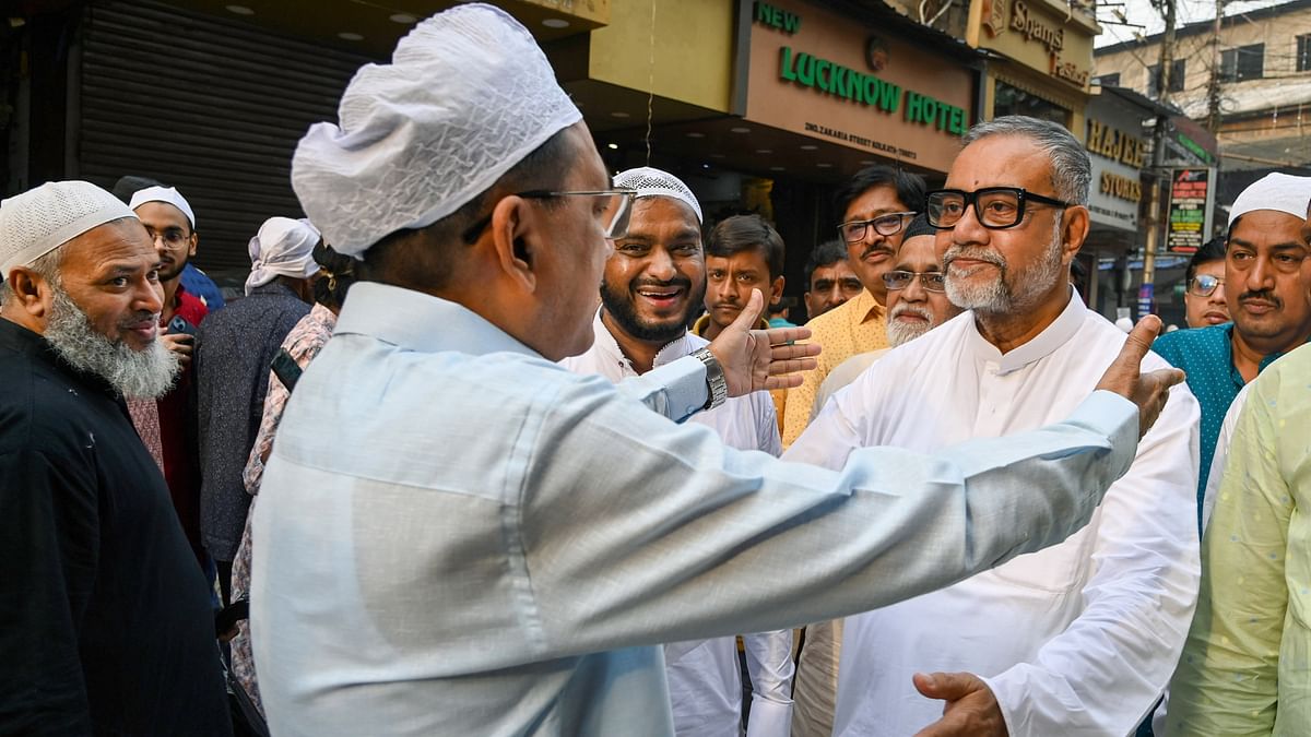 BJP candidate Tapas Roy greets Muslim devotees on the occasion of Eid-ul-Fitr, at Nakhoda Masjid, in Kolkata.