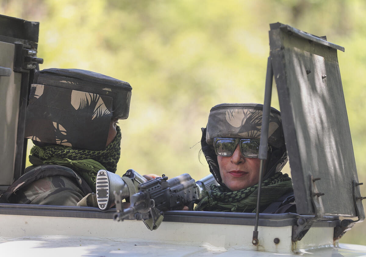 A female commando of the Special Operations Group (SOG) of J&amp;K Police during a security operation, in Jammu, Saturday, April 6, 2024. 