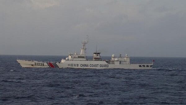 China's coast guard expels Philippine vessels from Scarborough Shoal, says state media