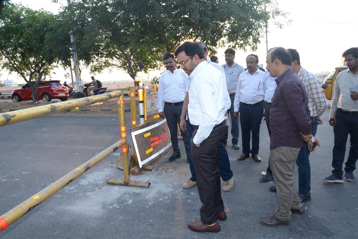 BWSSB Chairman Ramprasat Manohar V and board officials inspect the accident spot on Monday. They said signboards indicating a diversion because of the ongoing work were clearly placed around the pit. 