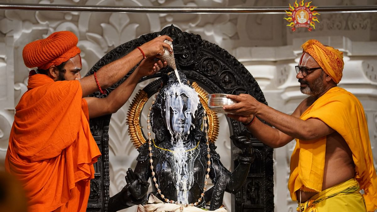 Priests perform 'abhishek' of Ram Lalla on the occasion of 'Ram Navami' festival, at the Ram Temple in Ayodhya.