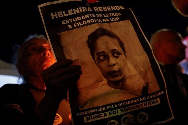 Demonstrators pay tribute to the victims of the military dictatorship during a protest to mark the 60th anniversary of Brazil's 1964 military coup, in Sao Paulo.