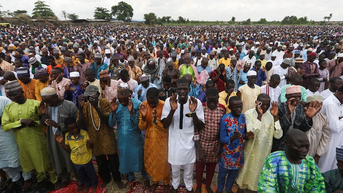 Muslim faithful attend the Eid al-Fitr prayers, marking the end of Ramadan, in Lagos, Nigeria.