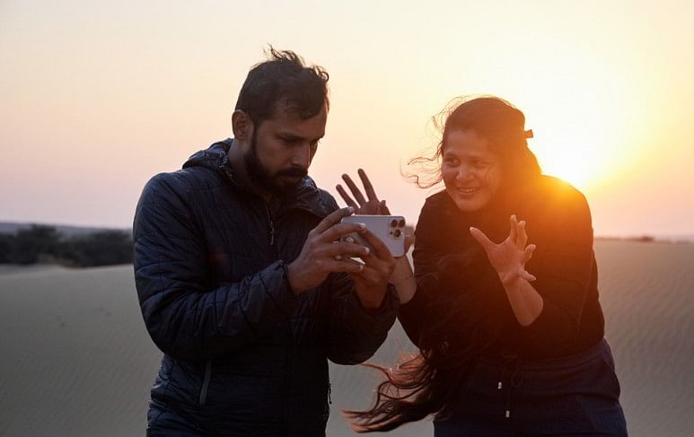 Archana Atul Phadke (right) worked with cinematographer Amith Surendran (left), using the 120 mm 5x Telephoto camera of iPhone 15 Pro Max to add depth to the vast desert landscape setting.