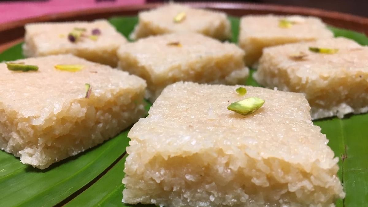 Barfi: A dense milk-based sweet usually flavored with cardamom, rose water, or nuts, offered as prasad during puja ceremonies.