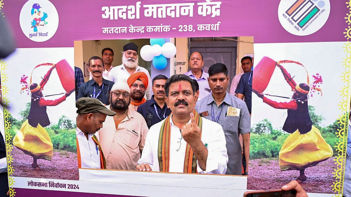 Chhattisgarh Deputy Chief Minister Vijay Sharma shows his finger marked with indelible ink after casting his vote in the second phase of Lok Sabha elections, at Kawardha in Kabirdham.