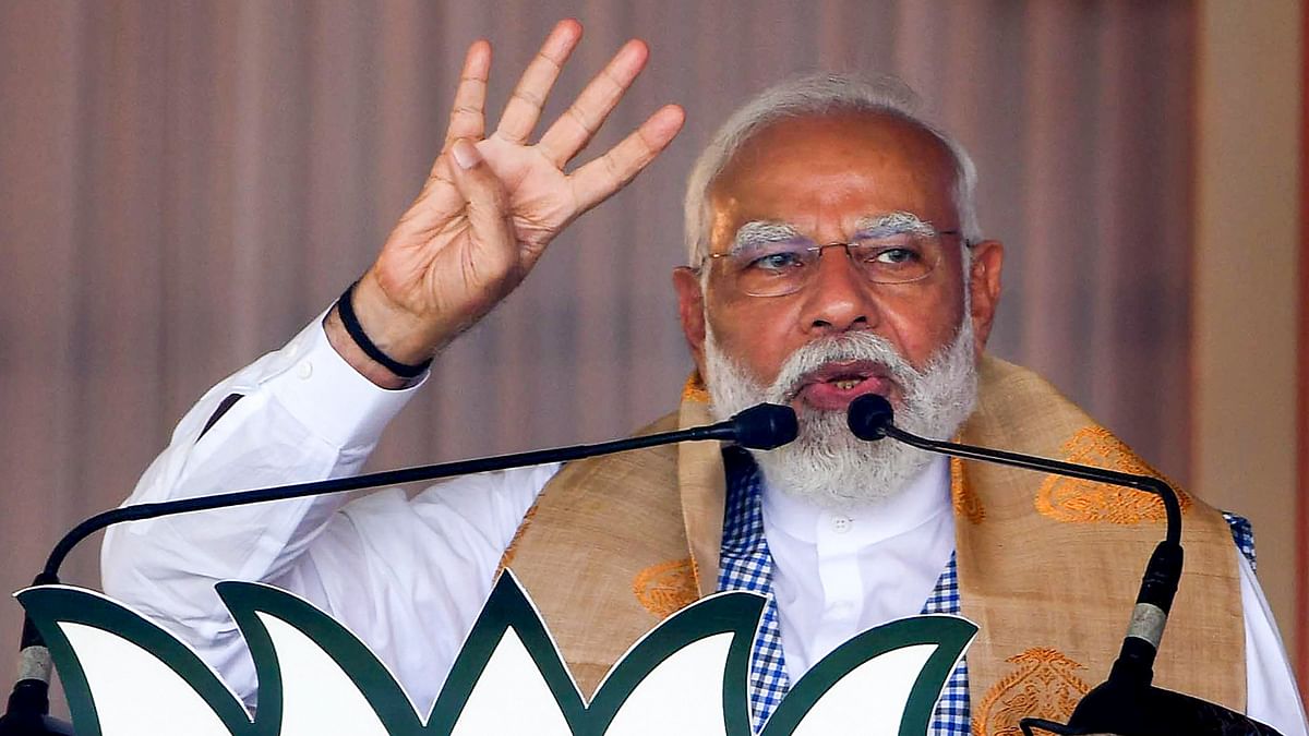 Prime Minister Narendra Modi gestures as he addresses a public meeting in Nalbari district, Assam.