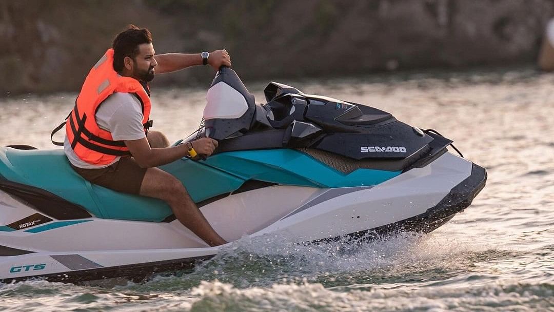 Away from the glare of the media spotlight and the pressures of the IPL, Rohit is seen enjoying riding the water scooter.
