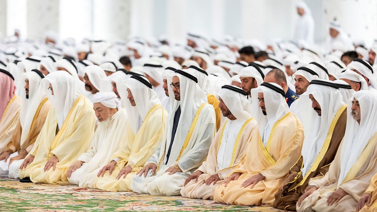 Sheikh Mohamed bin Zayed Al Nahyan, President of the United Arab Emirates and Sheikh Mansour bin Zayed Al Nahyan, UAE Vice President and Deputy Prime Minister, attend Eid Al Fitr prayers at the Sheikh Zayed Grand Mosque, in Abu Dhabi.