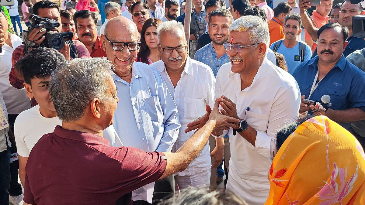 BJP candidate from Jodhpur constituency Gajendra Singh Shekhawat interacts with people as he arrives to cast his vote in the second phase of Lok Sabha elections, in Jodhpur.