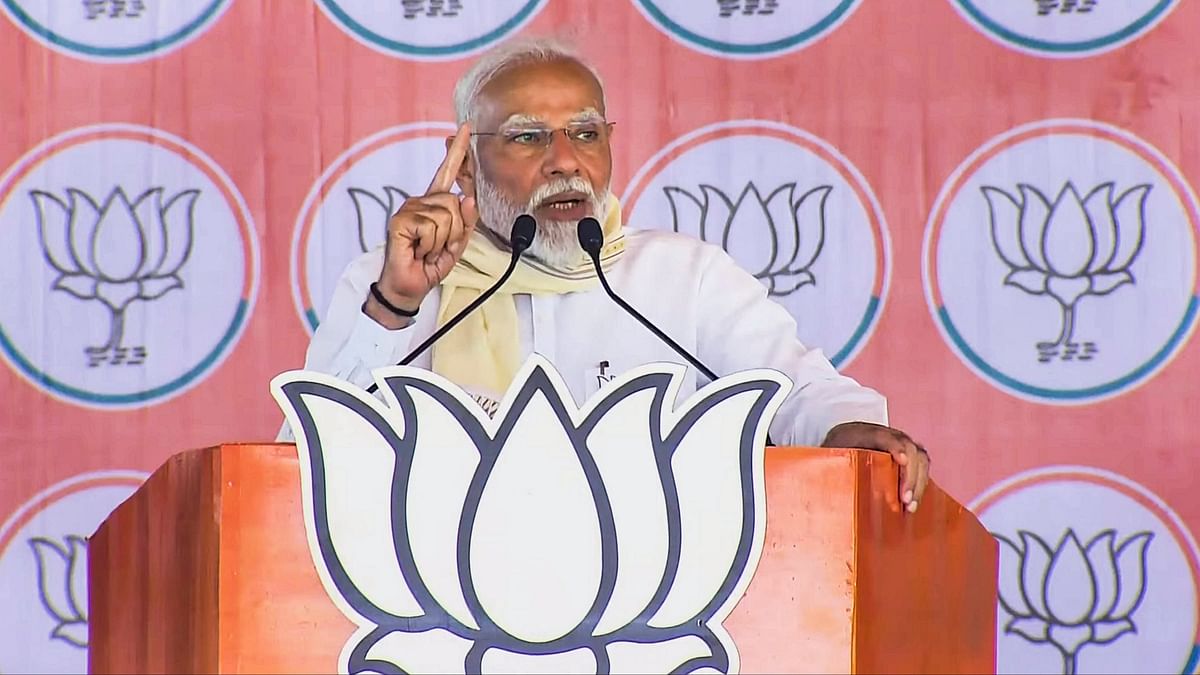 Prime Minister Narendra Modi addresses a public meeting organised for BJP's campaign for the Lok Sabha elections, in Amroha.