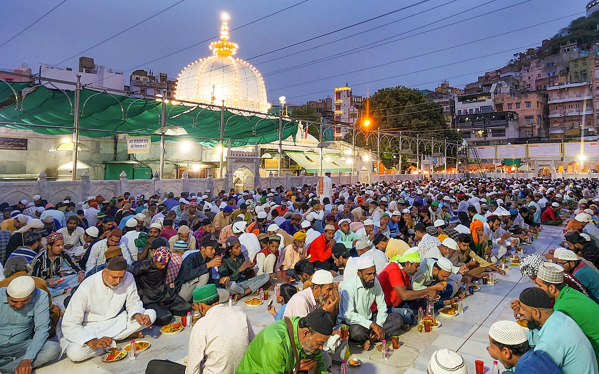 Muslims attend an 'Iftar' during the holy month of Ramadan at the Khwaja Moinuddin Chishti Dargah, in Ajmer, Thursday, April 4, 2024.