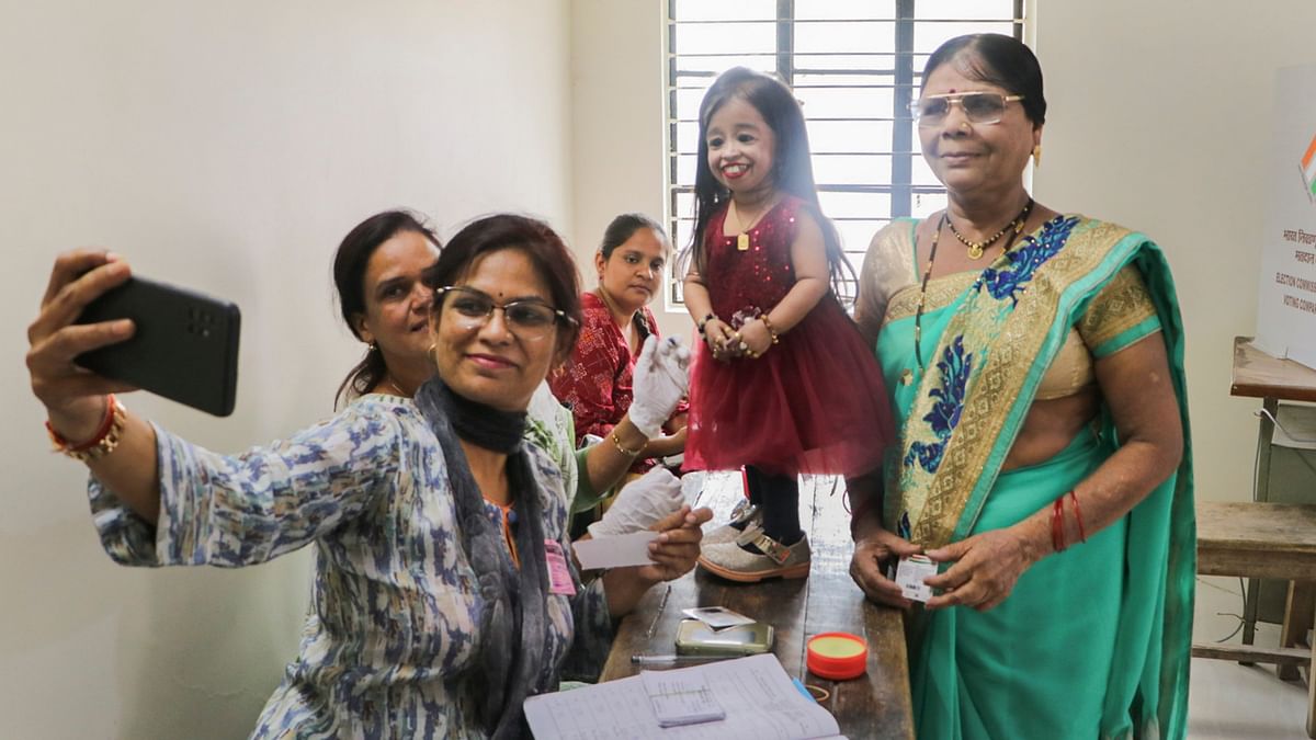 World's shortest woman Jyoti Amge at a polling station to cast her vote for the first phase of Lok Sabha elections, in Nagpur.