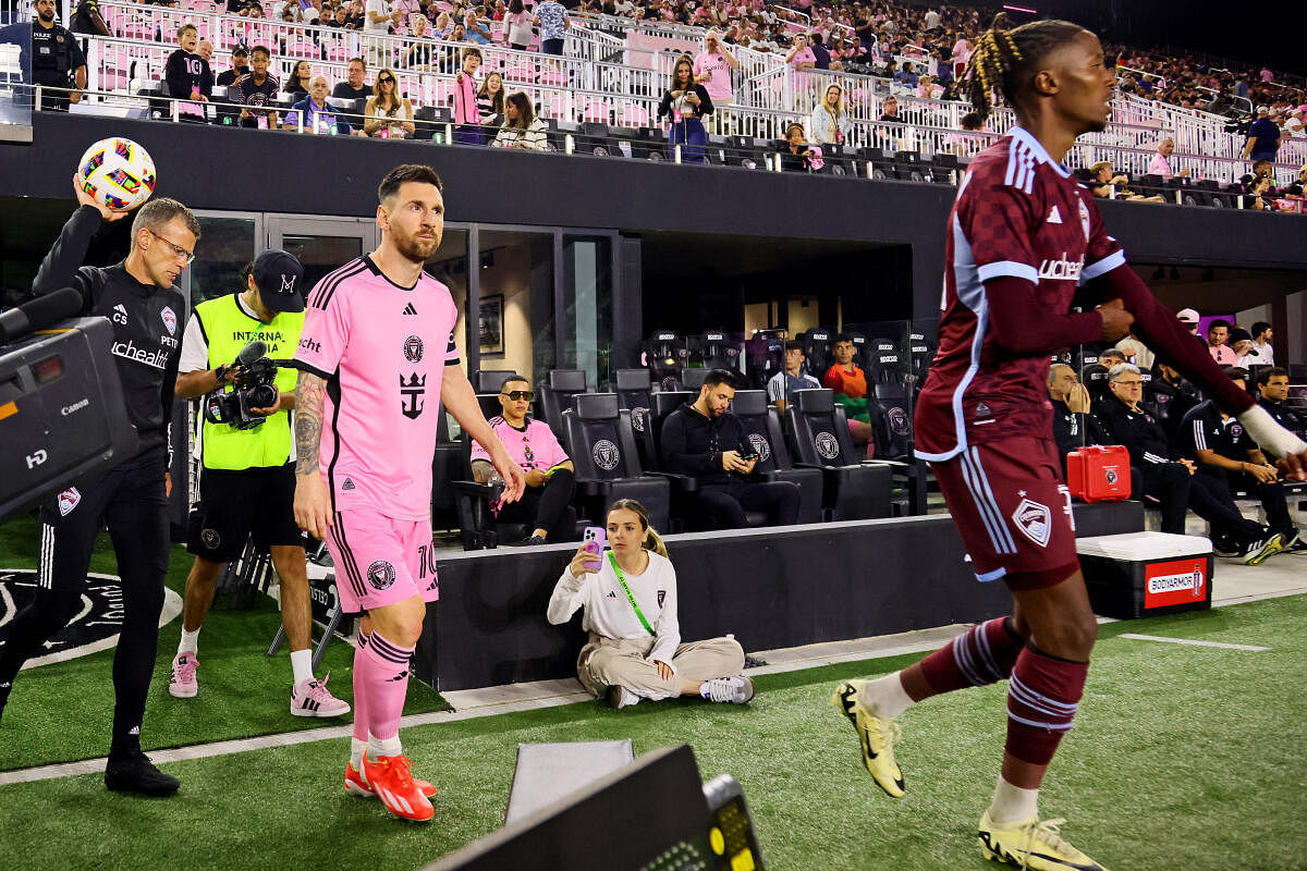 Inter Miami CF forward Lionel Messi (10) walks onto the pitch for the second half against the Colorado Rapids at Chase Stadium. 