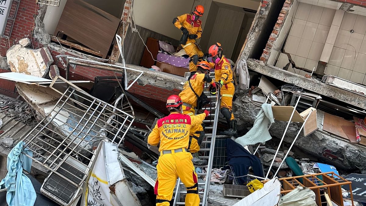 At least 26 buildings have collapsed, more than half in Hualien, with about 20 people trapped and rescue work going on.