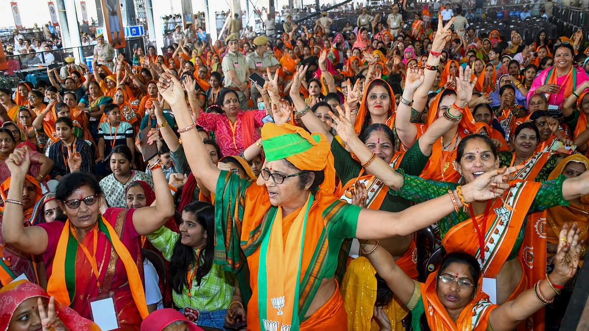 BJP supporters during raises slogans at Prime Minister Narendra Modi's rally, in Churu, Rajasthan.