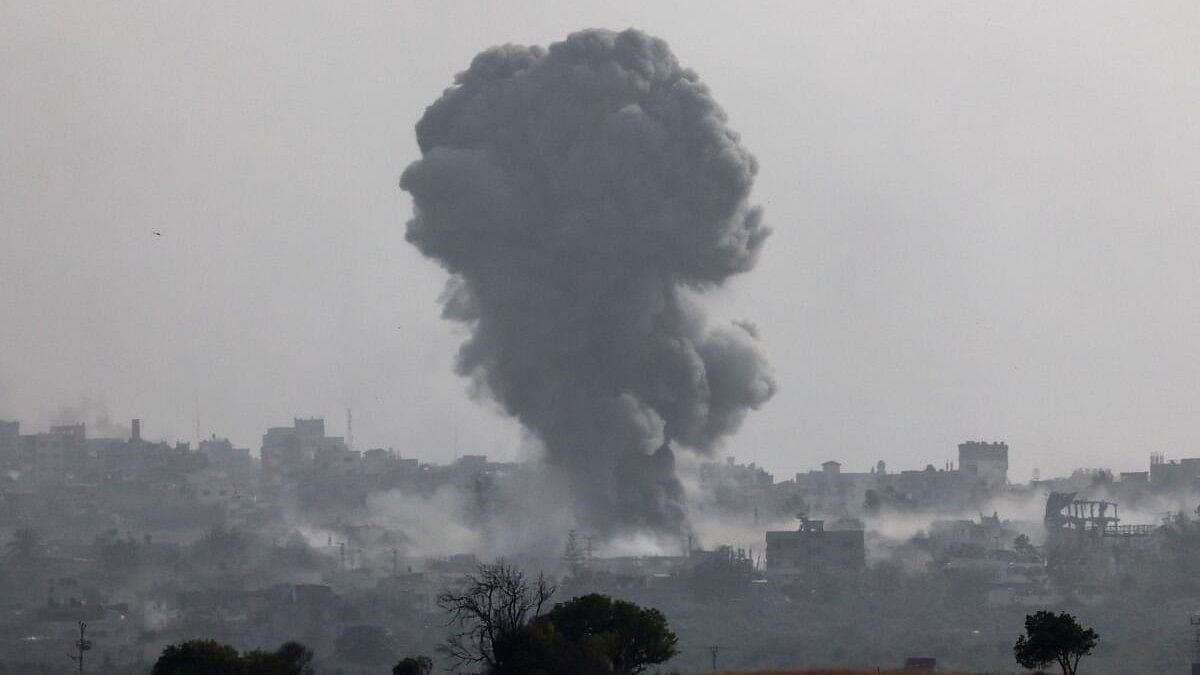 Smoke rises from an explosion following an airstrike in Gaza, amid the ongoing conflict between Israel and the Palestinian Islamist group Hamas, near the Israel-Gaza border, as seen from Israel, May 20, 2024.