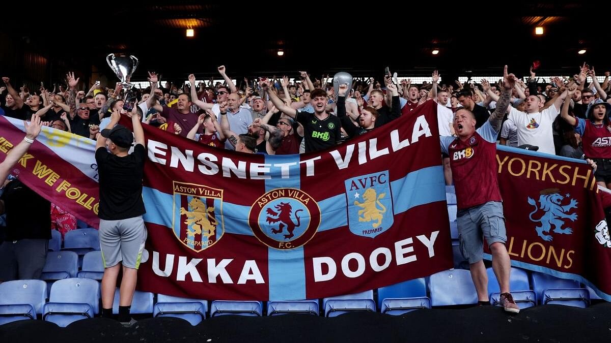Aston Villa fans celebrate qualifying for the Champions League.