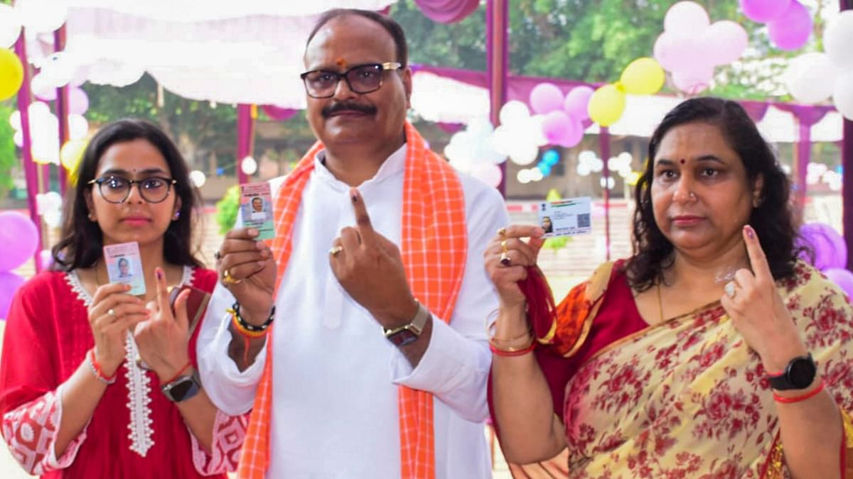 Uttar Pradesh Chief Minister Brajesh Pathak with his family after casting his vote in Lucknow during the fifth phase of Lok Sabha elections.