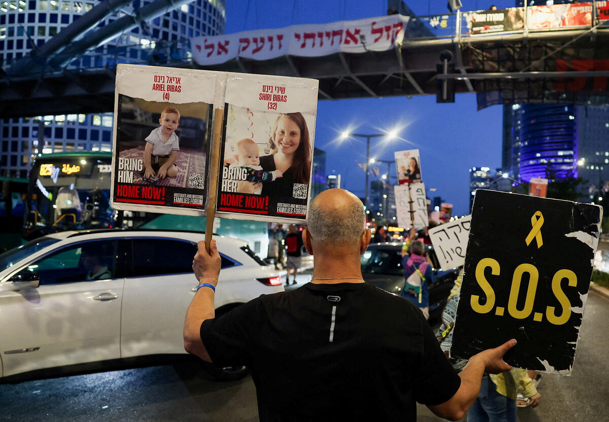 A demonstrator takes part in a protest demanding the immediate release of hostages who were kidnapp