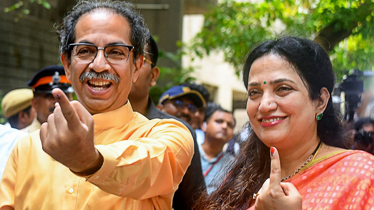 Former Maharashtra chief minister Uddhav Thackeray with wife Rashmi Thackeray after casting his vote during the fifth phase of Lok Sabha elections, in Mumbai.