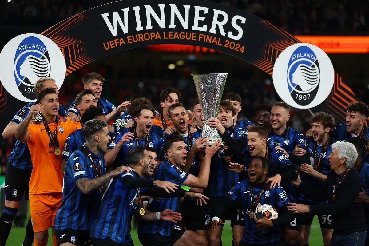 Atalanta players celebrate their first ever Europa League cup.