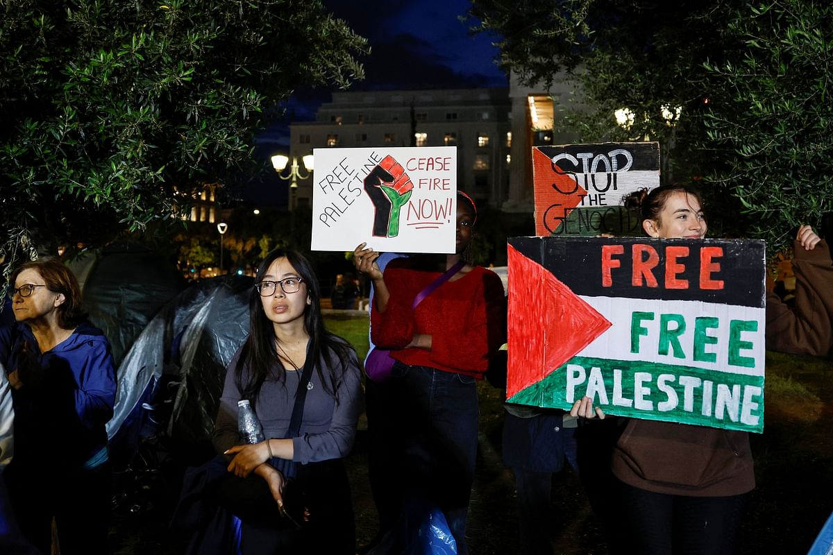 Students stage a night-long pro-Palestinian rally in front of the University of Athens