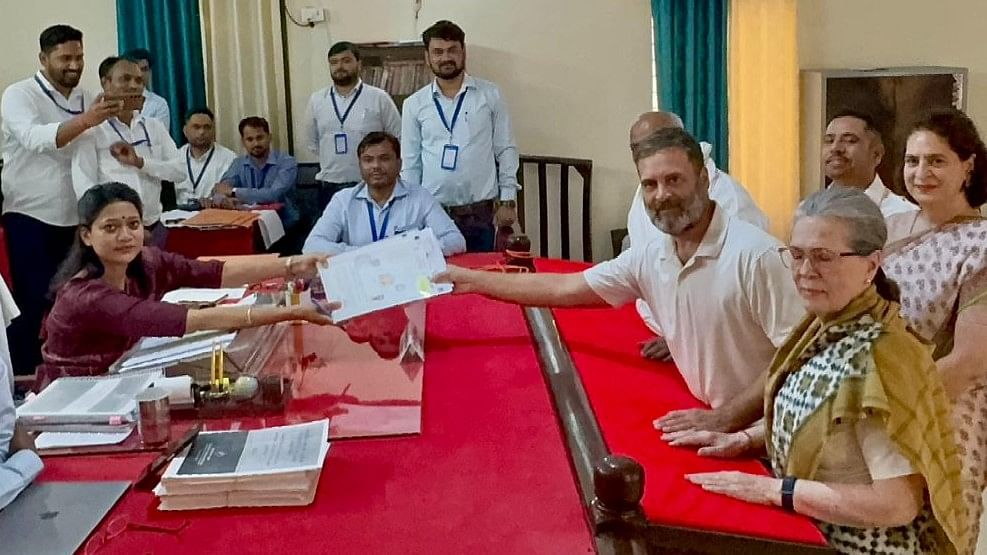 Rahul Gandhi is seen posing for a photo after filing the papers at the collectorate in Raebareli, Uttar Pradesh.