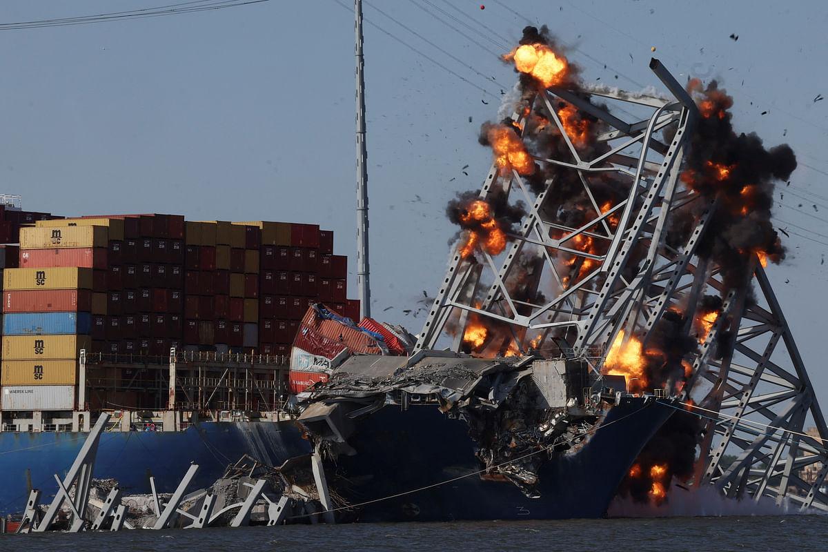 Explosives are detonated to free the container ship Dali, after it was trapped following its collision with the Francis Scott Key Bridge, causing it to collapse, in Baltimore, Maryland, US.