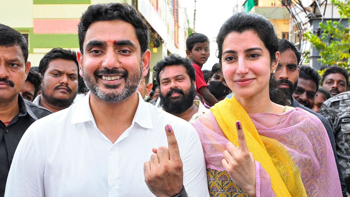 Telugu Desam Party (TDP) national general secretary Nara Lokesh shows his inked finger after casting his vote at a polling station during fourth phase of Lok Sabha polls, in Guntur.