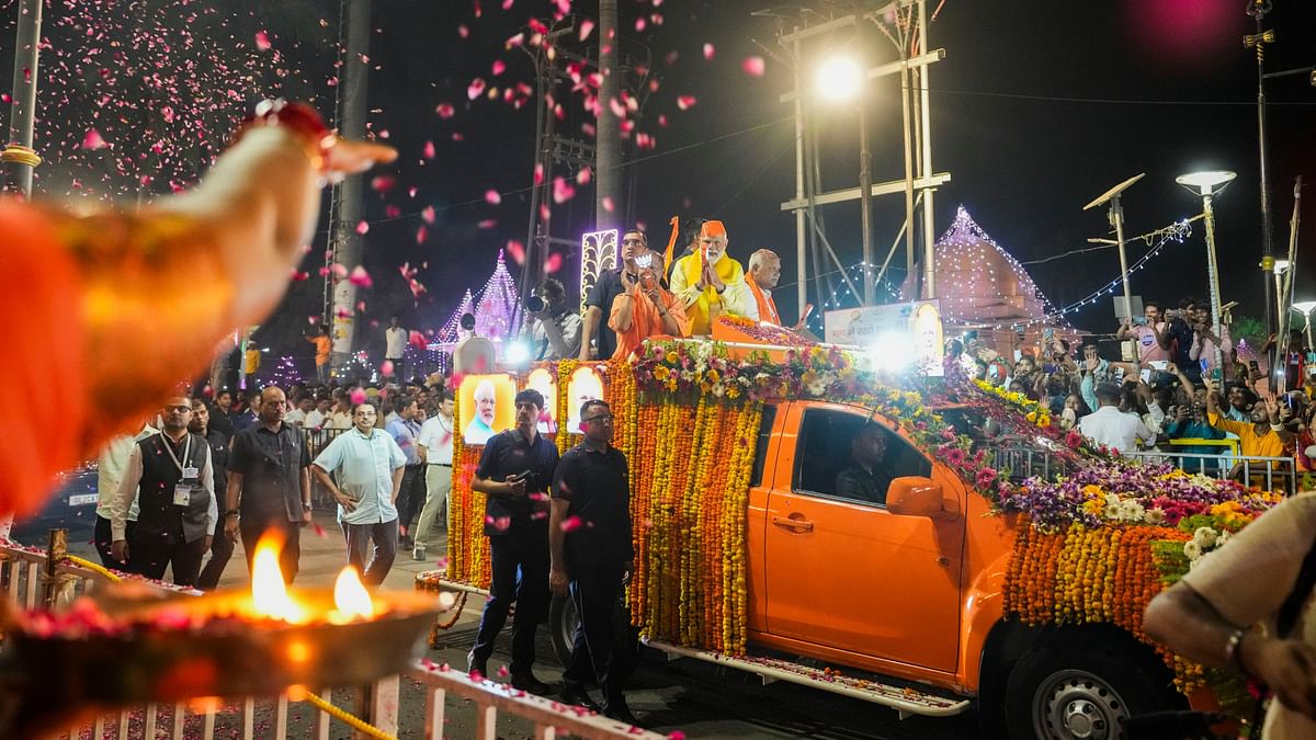 Prime Minister Narendra Modi during a roadshow for Lok Sabha elections, in Ayodhya.