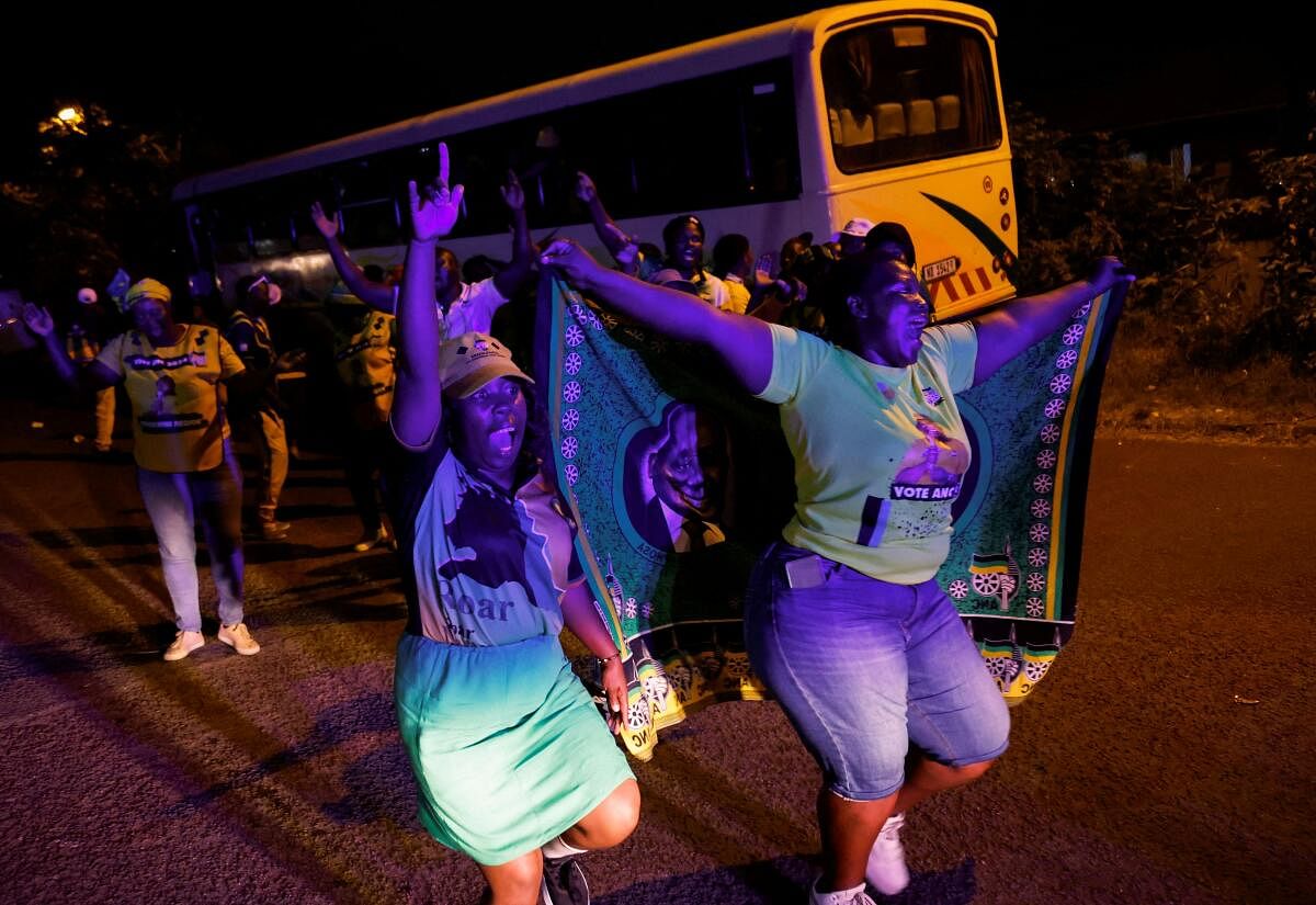 Supporters of South African President Cyril Ramaphosa sing after an election rally in Chatsworth, South Africa, May 18, 2024.