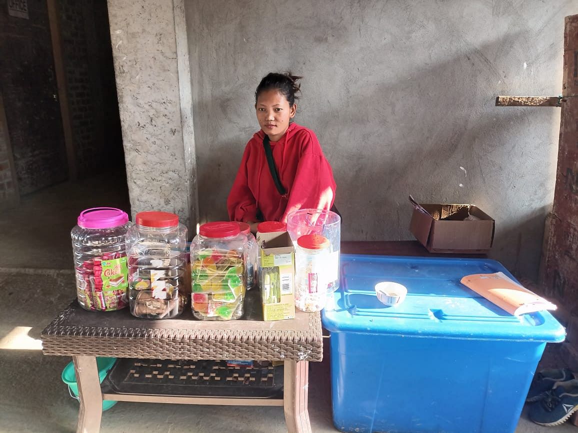 Kuki woman selling grocery items inside a relief camp in Churachandpur district.