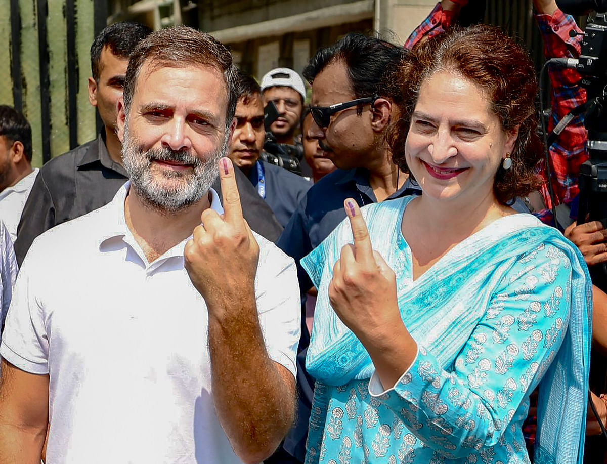 Congress leaders Rahul Gandhi and Priyanka Gandhi show their inked fingers after casting their votes during the sixth phase of Lok Sabha elections, in New Delhi, on Saturday.