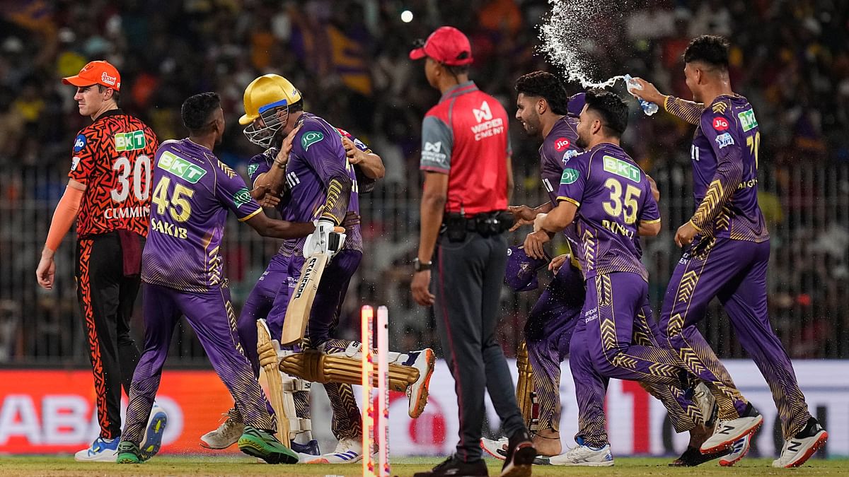 Kolkata Knight Riders players celebrate their victory in the Indian Premier League (IPL) 2024 final cricket match against Sunrisers Hyderabad at MA Chidambaram Stadium, in Chennai.