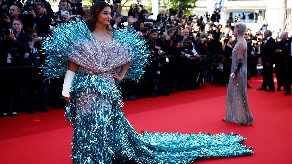 In her second appearance at the 2024 Cannes Film Festival, Aishwarya Rai Bachchan wore a shimmery blue and silver gown by designer duo Falguni Shane Peacock.