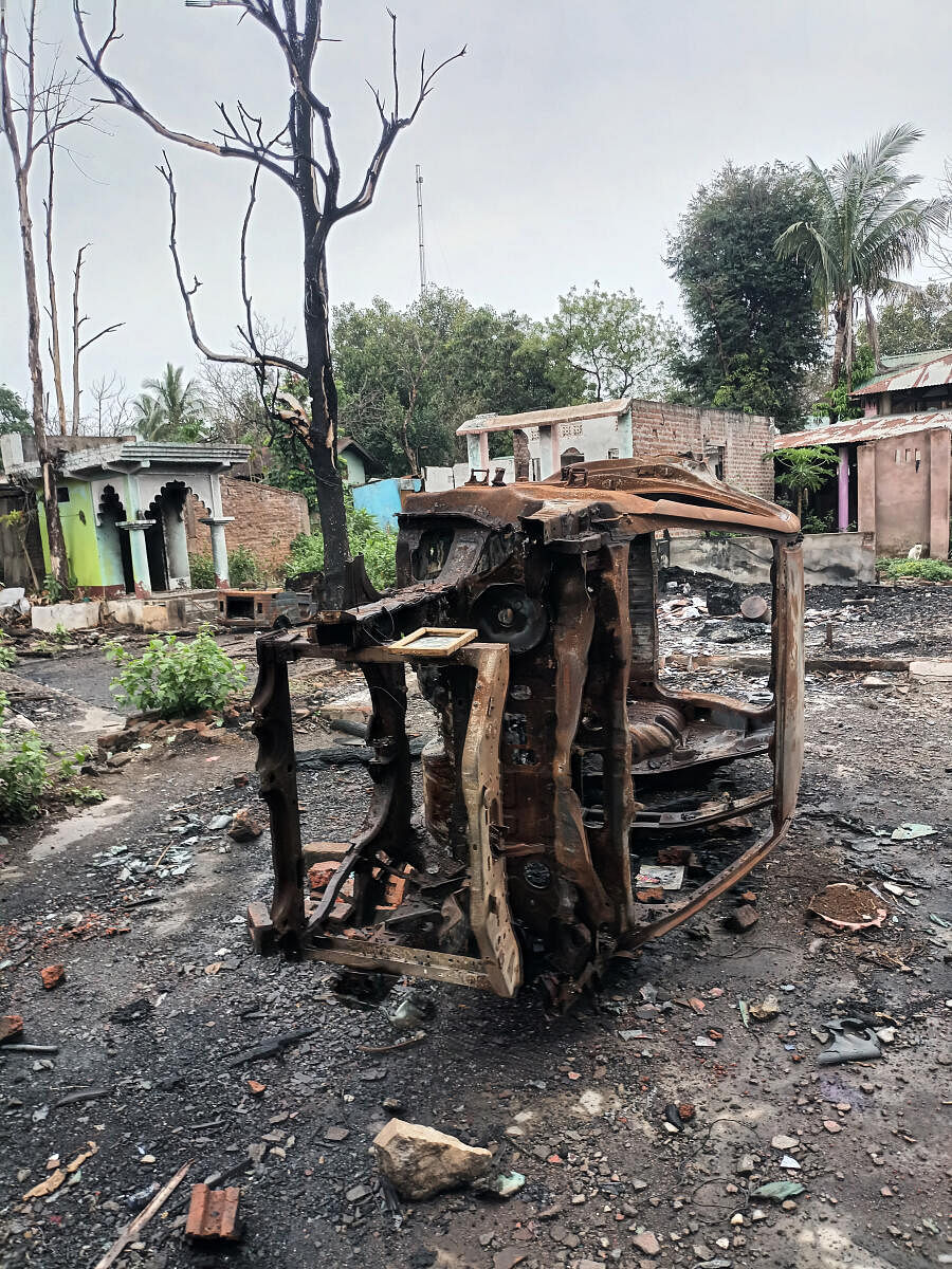 Remains of a burned vehicle on the streets of Moreh.