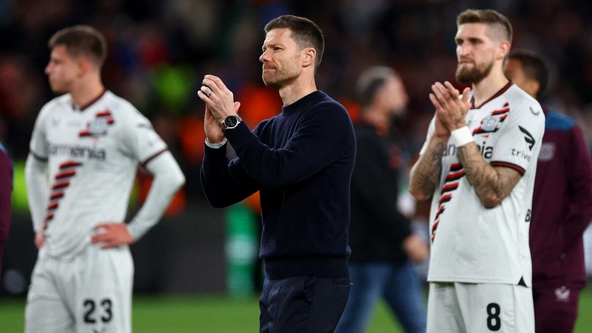 Xabi Alonso looks dejected after the match. There were reports of interest in the Spaniard from Bayern Munich and Real Madrid, but he chose to continue with Leverkusen for another season.