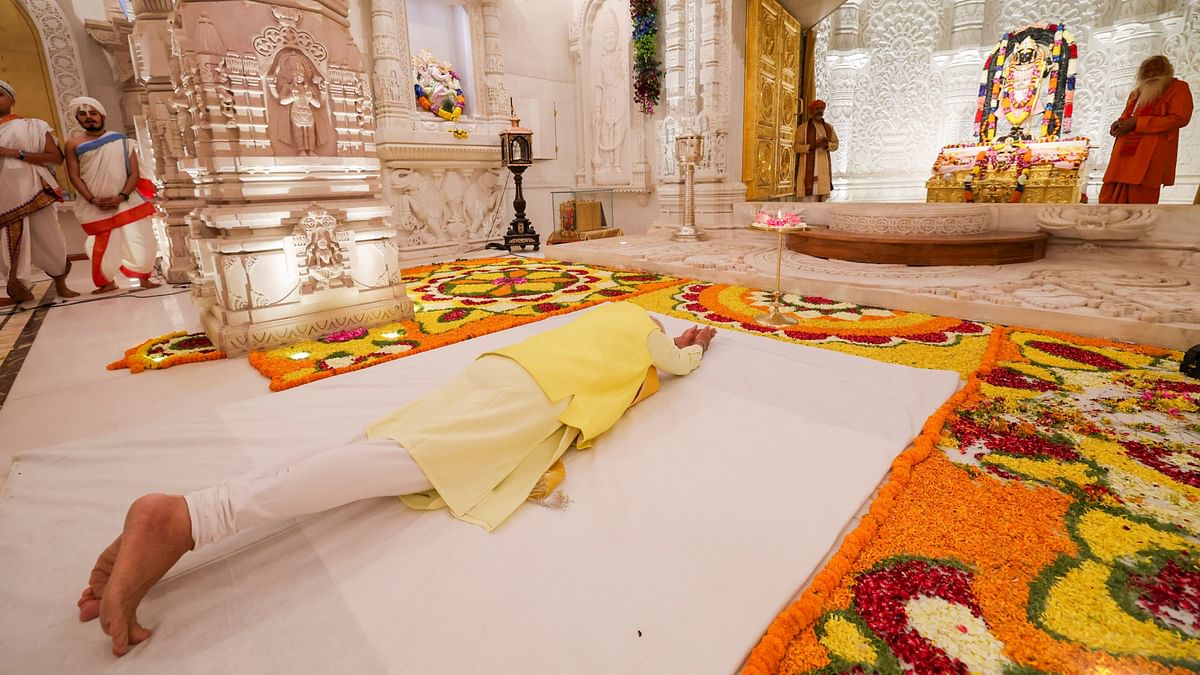 Prime Minister Narendra Modi stretches before Lord Ram at the Ram temple, in Ayodhya, offering prayers.