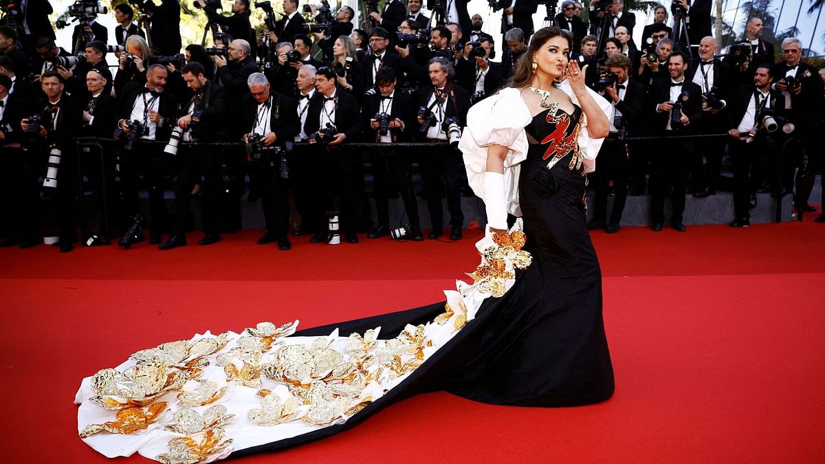 A regular at the Cannes Film Festival for the past two decades, Aishwarya debuted at the 2024 edition in the monochrome gown adorned with 3D metallic elements and golden accents by Falguni Shane Peacock.